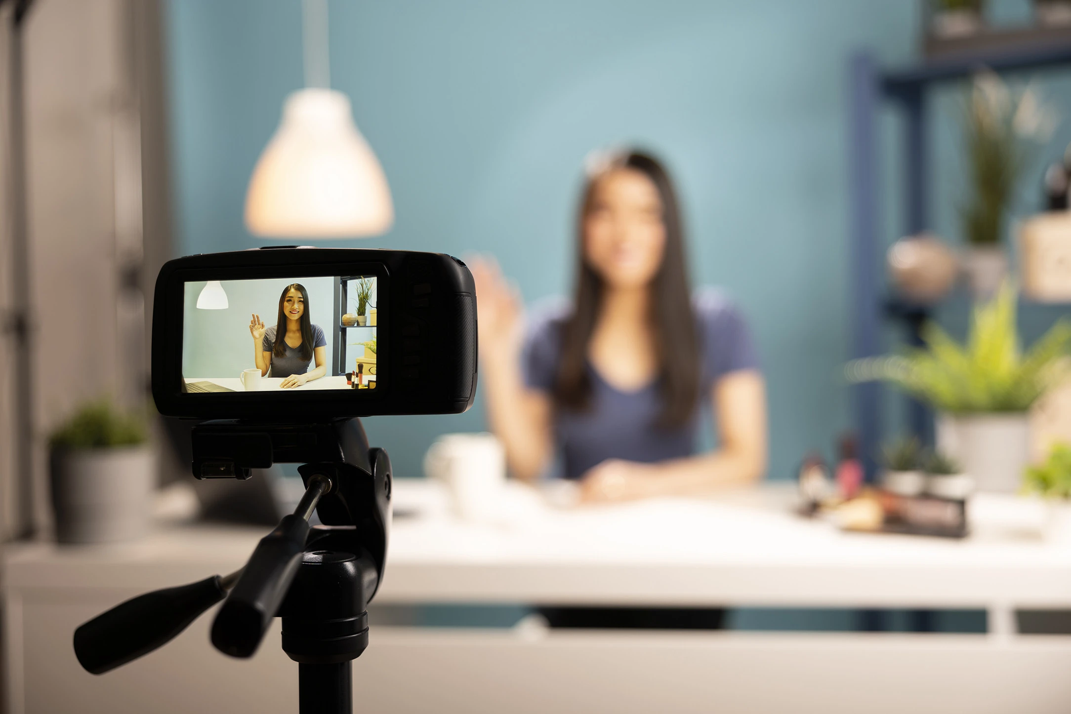 digital-camera-records-woman-waving.jpg