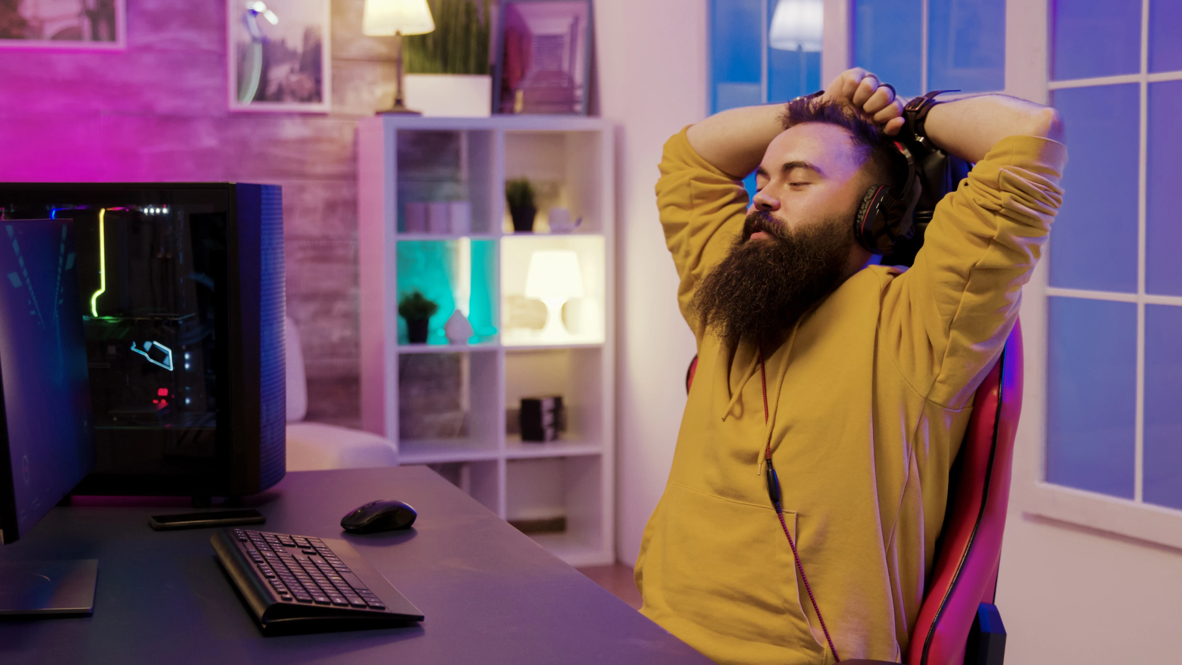 happy-bearded-man-after-wining-online-gaming-man-wearing-headphones-while-playing-video-games.jpg