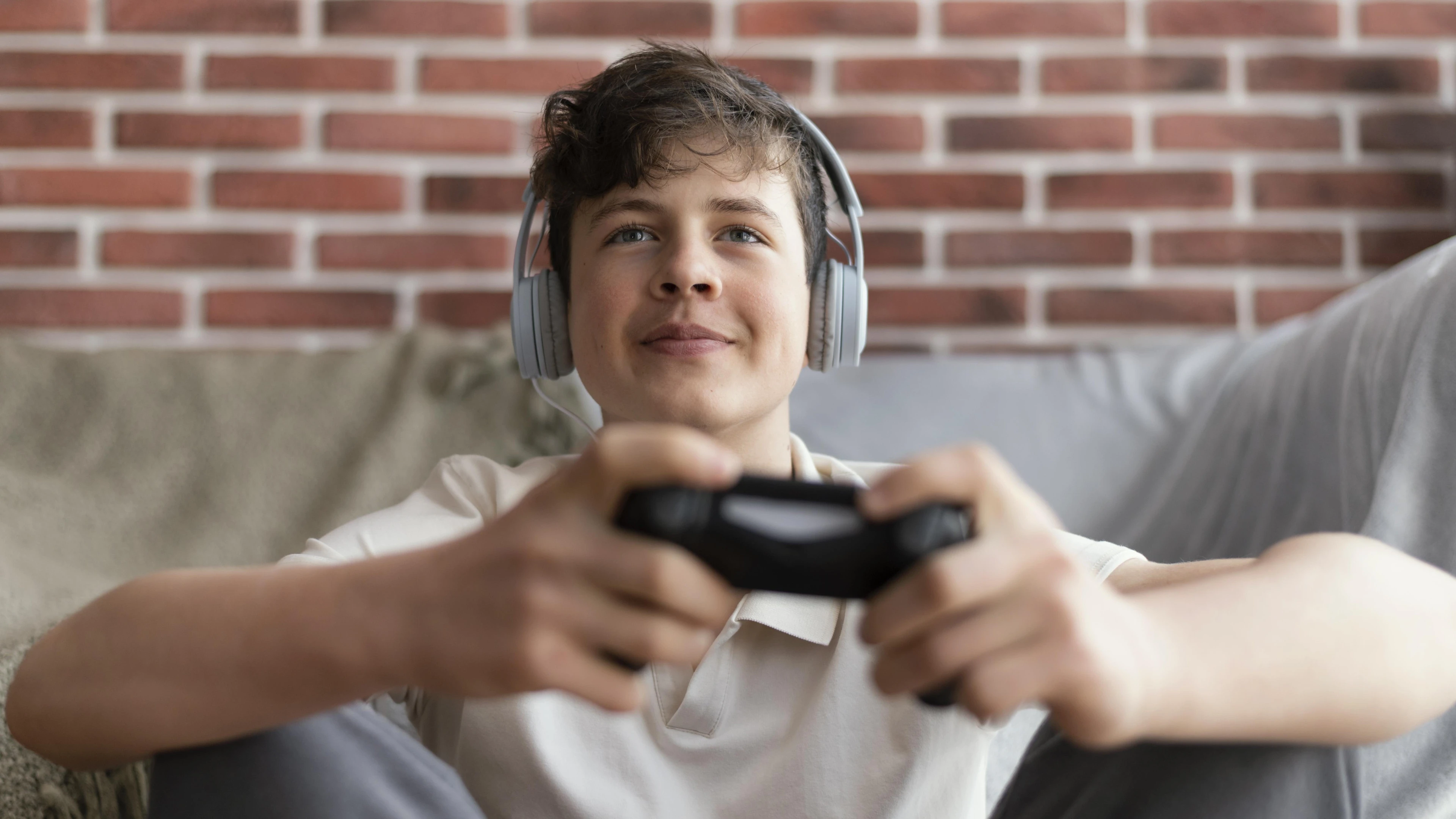 medium-shot-boy-playing-with-controller.jpg